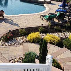 Pool area landscaping with steps